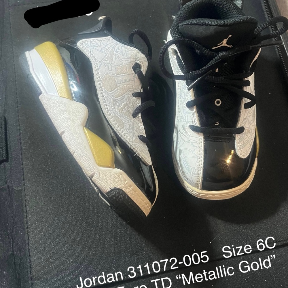 Jordan Kids Sneakers in Black, White, and Metallic Gold